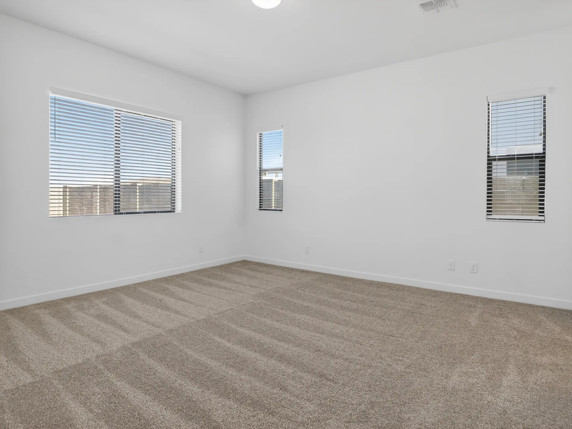 Empty bedroom vs virtually staged bedroom — before